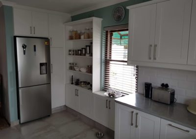 custom kitchen built out with white doors 6