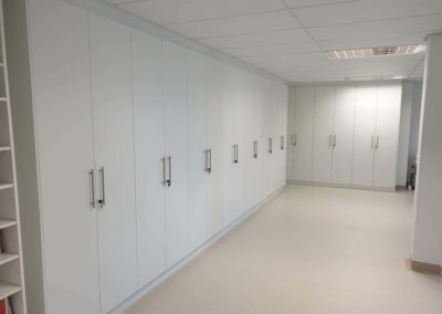 large selection of storage cupboards with white doors