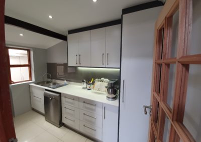bespoke designs white kitchen installation with white counters 5